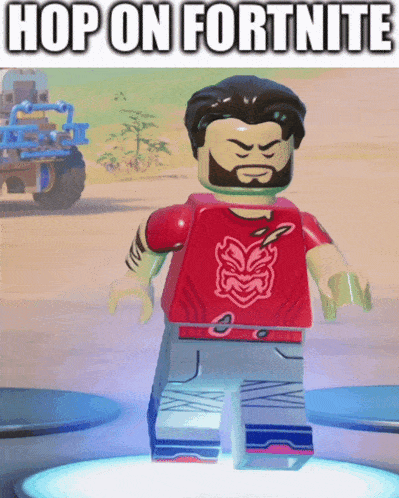 a lego man with a beard wearing a red shirt with a tiki on it