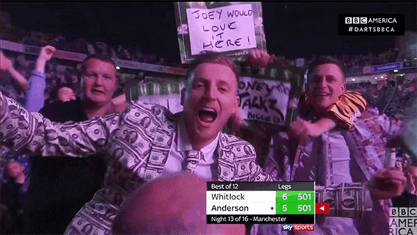 a man holding a sign that reads joey would love it here