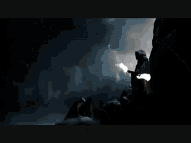 a person is holding a sword in a dark cave with the words ante pe ii written on the bottom .