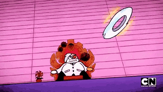 a cartoon character is sitting in a chair and a cartoon network logo is visible