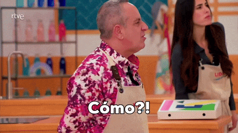 a man in an apron says " como " in front of a woman in an apron
