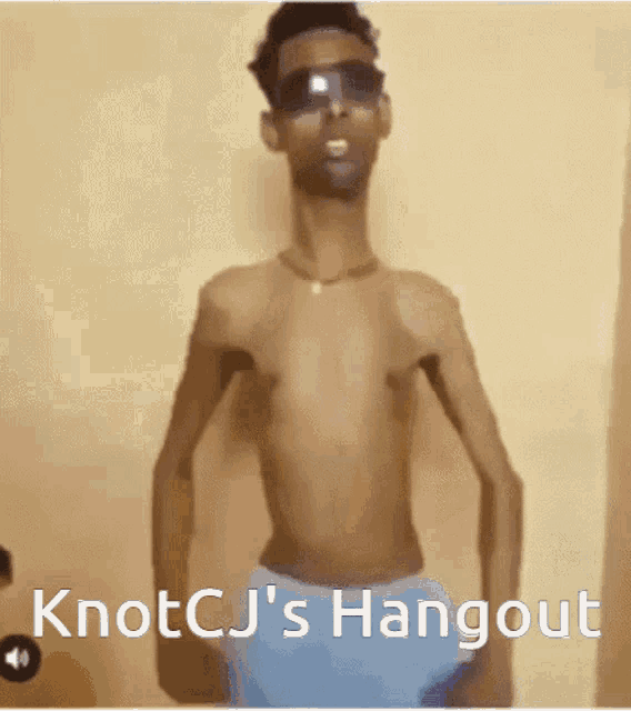 a shirtless man wearing sunglasses stands in front of a wall with the words knotcj 's hangout below him