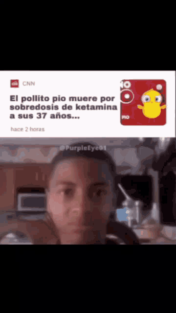 a man 's face is shown in front of a cnn news article
