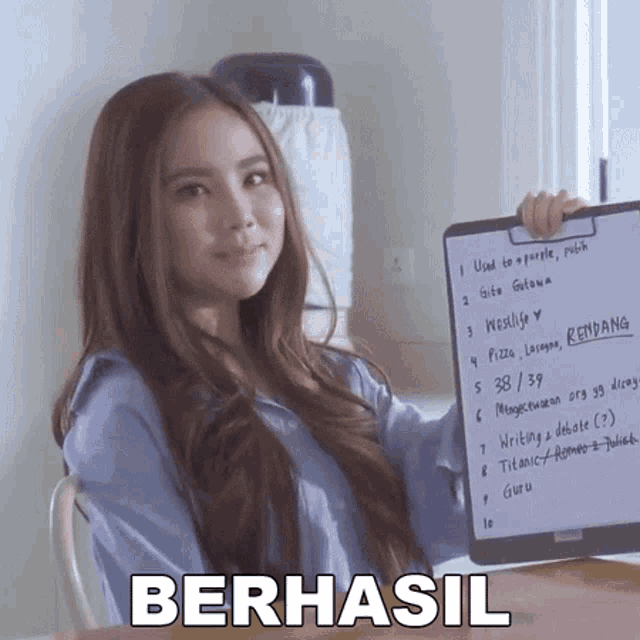 a woman is holding a clipboard with a list of things on it and the word berhasil in the corner