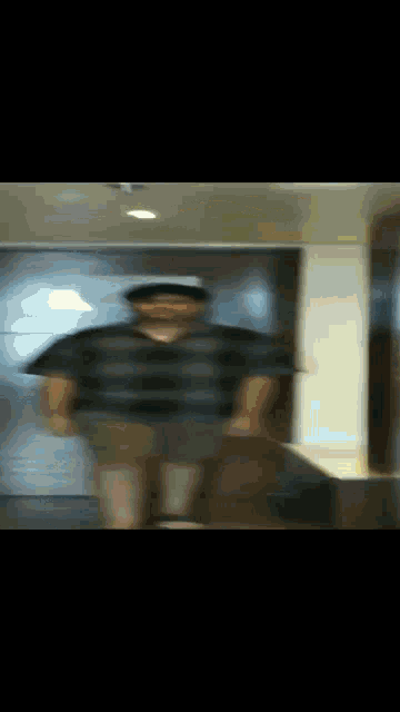 a blurry picture of a man in a black shirt