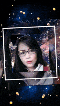 a woman wearing glasses is surrounded by fireworks and butterflies
