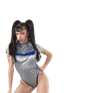a woman in a silver leotard is stretching her arms out