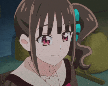 a close up of a girl with a ponytail and red eyes