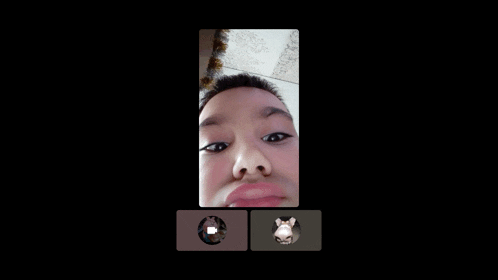 a boy is talking on a video call with another person