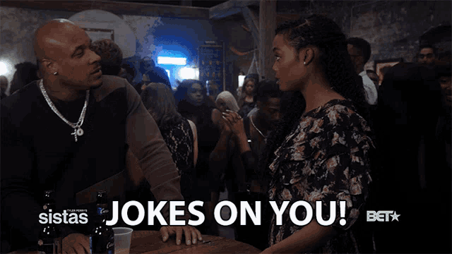 a sistas jokes on you advertisement with a man and woman in a crowd