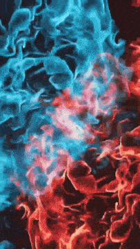 blue and red flames are coming out of the ground