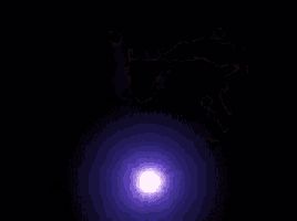 a heart shaped glowing object in the dark with a purple background