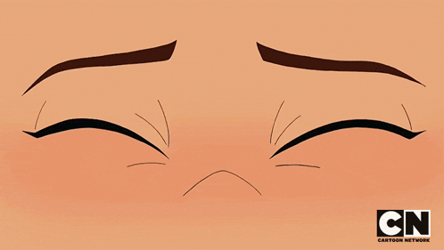 a close up of a cartoon character 's eyes with cn cartoon network written below them