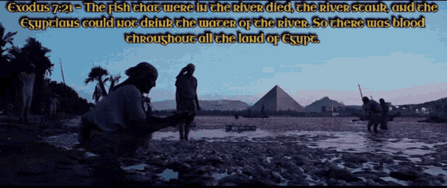 a picture of a river with a pyramid in the background