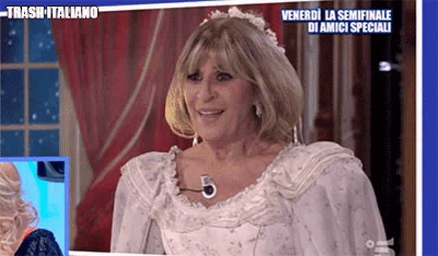 a woman in a white dress with trash italiano written on the bottom right