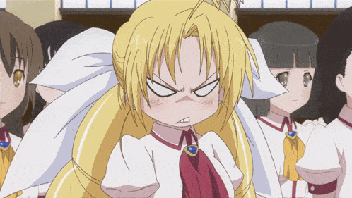 a girl with a crown on her head is making a funny face