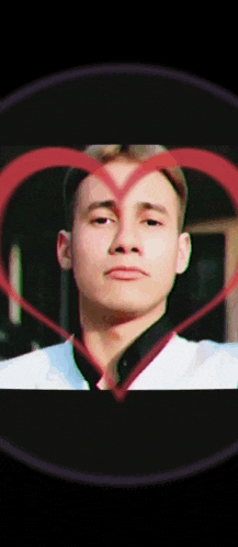 a man 's face is surrounded by a heart
