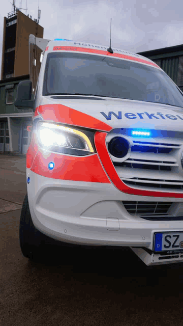 a red white and blue ambulance with the word werkster on the side