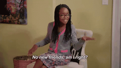 a young girl is sitting in a chair and saying no new friends am i right ?