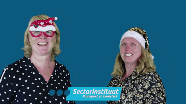 two women wearing santa hats with the words sectorinstituut transport en logistick below them