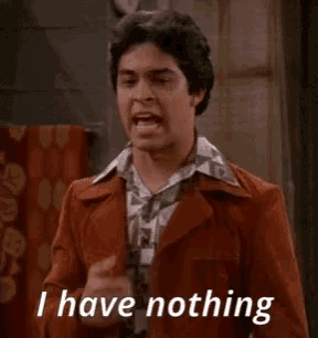 a man in a brown jacket says i have nothing .