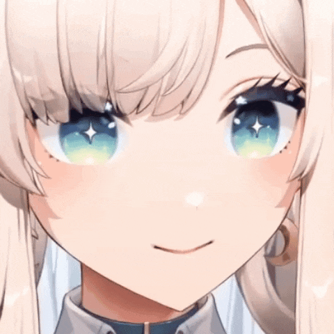 a close up of a girl 's face with a smile on her face .