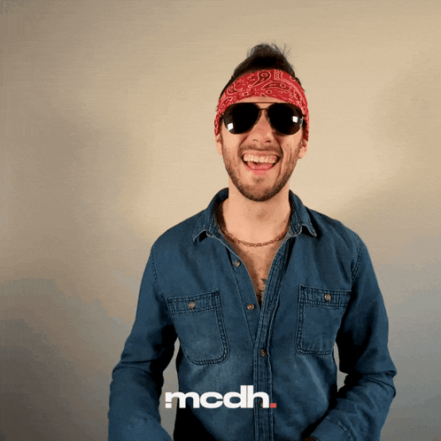 a man wearing sunglasses and a bandana with the word mcdh on the bottom right