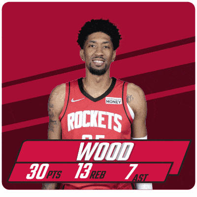 a man wearing a red rockets jersey with the number 25 on it