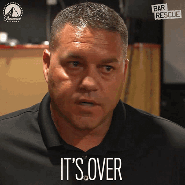a man says it 's over in front of a bar rescue poster