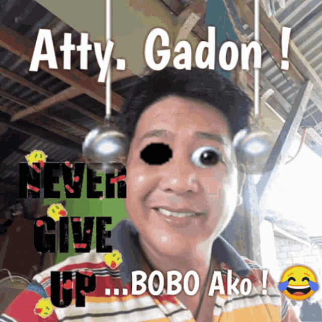 a man with a smiley face and the words atty gadon never give up