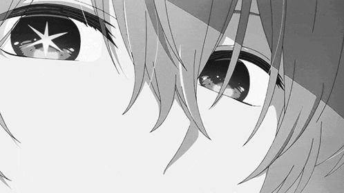 a close up of a person 's eyes with a star in the middle of them .