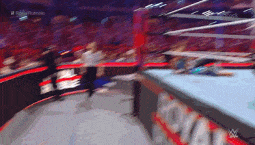 a blurry picture of a wrestling ring with the word royal on it