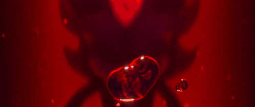 a close up of a person 's face with red lightning coming out of it