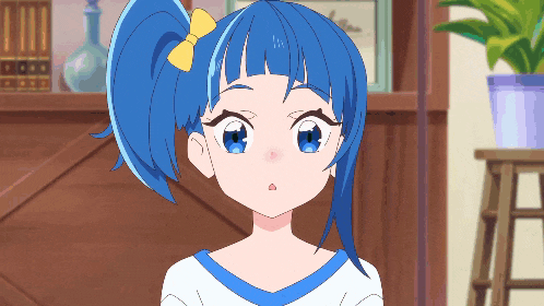 a girl with blue hair and a yellow bow on her hair