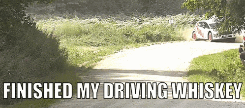 a picture of a car on a road with the words finished my driving whiskey