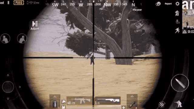 a screenshot of a video game called pubg showing a sniper aiming at a tree