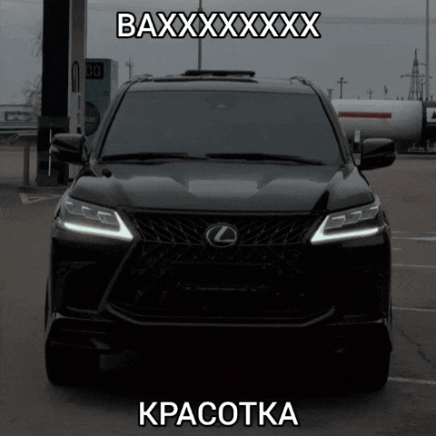 a black lexus suv is parked in a parking lot with a sign that says baxxxxxxxxxxxxxx