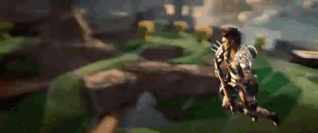 a man is running in a video game while holding a spear .