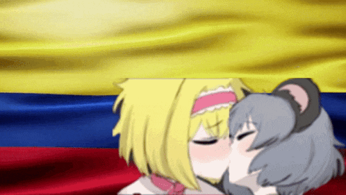 a couple of anime girls kissing in front of a colombian flag