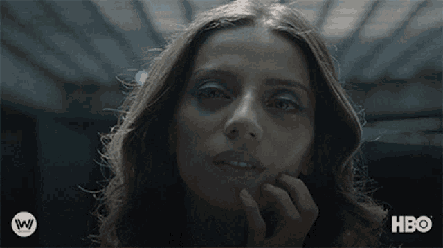 a close up of a woman 's face with the words hbo on the bottom