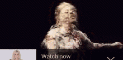 a woman is being transformed into a spider with lots of arms and legs .