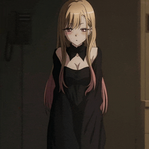 a girl with long blonde hair is wearing a black dress and a bow tie