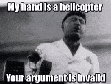 a black and white photo of a man holding a microphone and saying `` my hand is a helicopter your argument is invalid ''