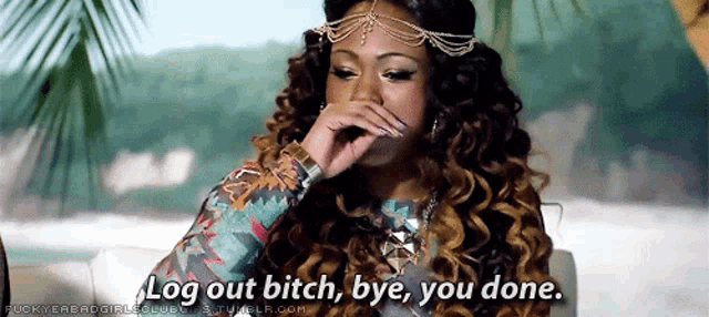 a woman with curly hair is covering her nose and says log out bitch bye you done