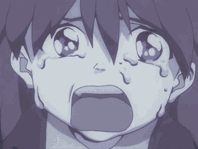 a close up of a child 's face with tears coming out of it
