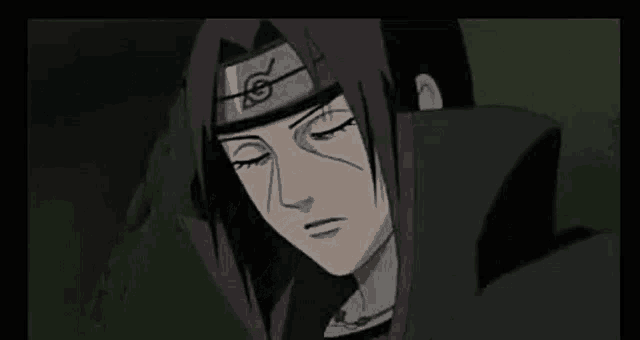 a close up of itachi uchiha from naruto wearing a headband and looking down .