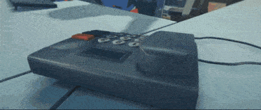 a calculator with a red button that says ' a ' on it