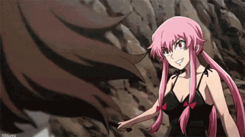 a girl with pink hair and a black dress is standing on a rock .