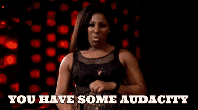 a woman singing with the words you have some audacity