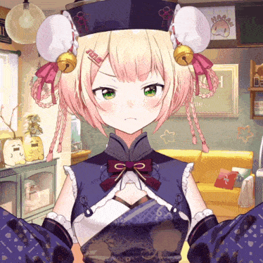 a girl with a bell on her head has a sticker on her hair that says ' a ' on it